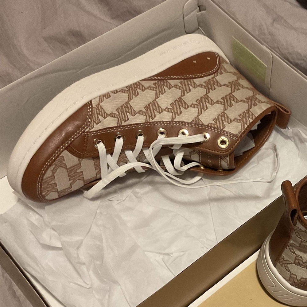 Gently used designer sneakers, high-rise, great condition wore them twice.